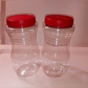 Clear Plastic Folgers Coffee Storage Jars with Red Lids - 12 oz Capacity